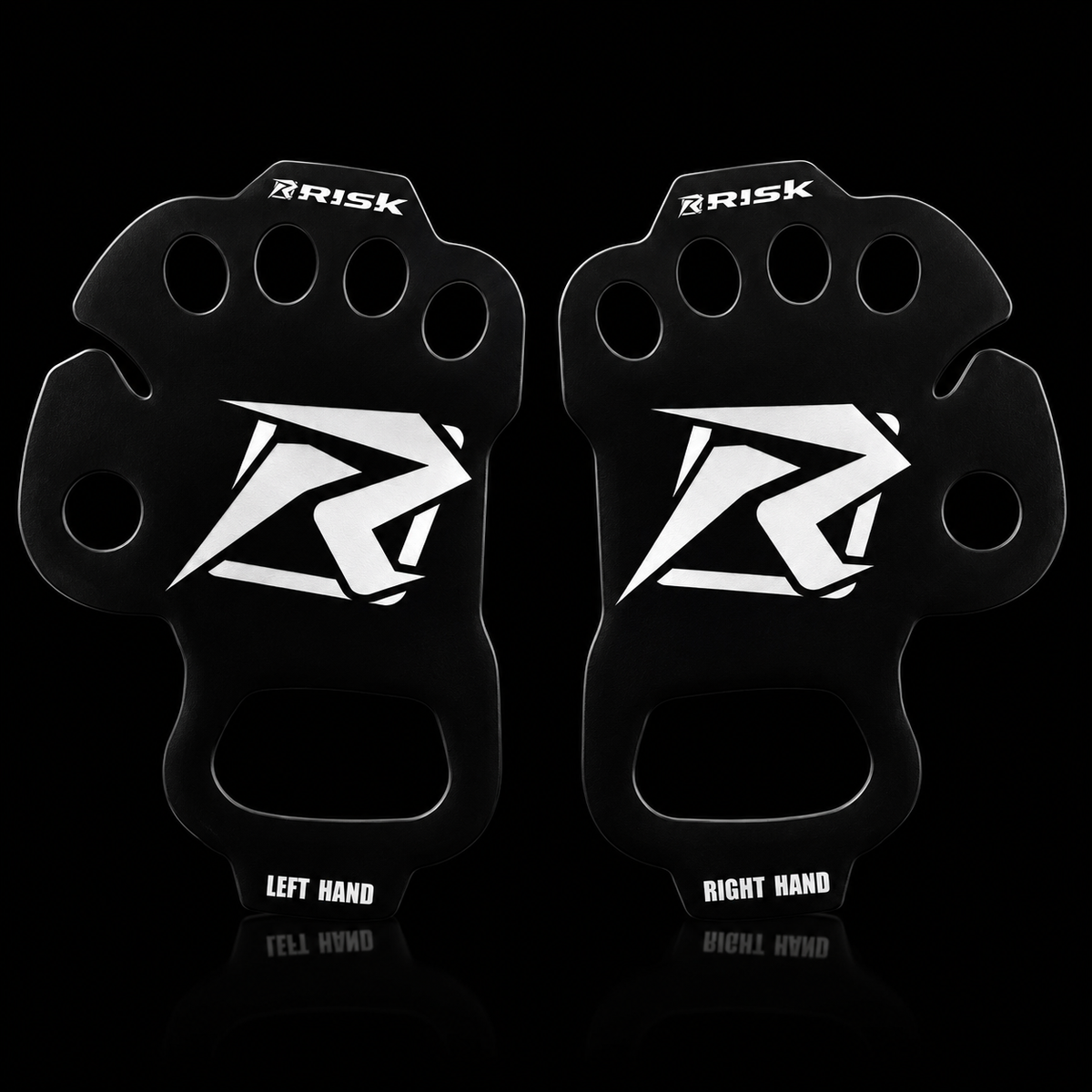 Left and right black Risk Racing palm protectors with subtle rim light on black