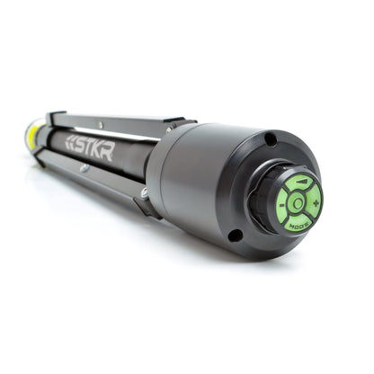 Folded up FLi-Pro Plus 10' Telescoping Area Light. camera focused on the bottom of the tripod showing us the magnetically attached FLi wireless remote..